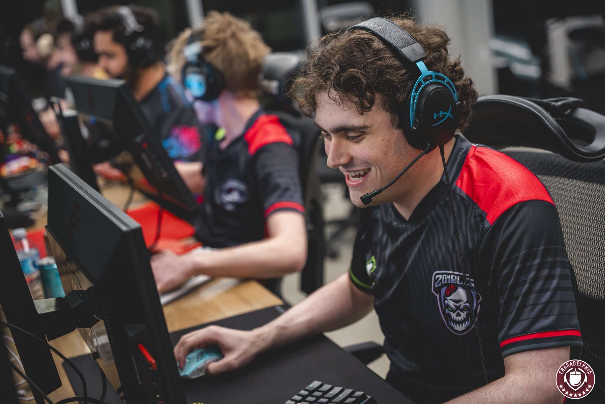 Zomblers competitors together at an esports event
